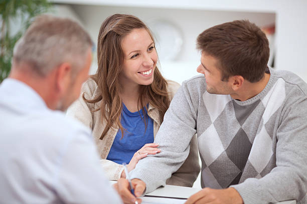 istock Couple with consultant 174768198