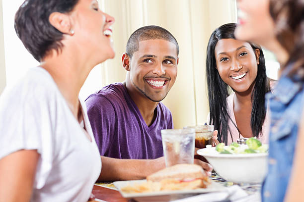 istock Young Woman Having Lunch With Friends At Restaurant. 174768255