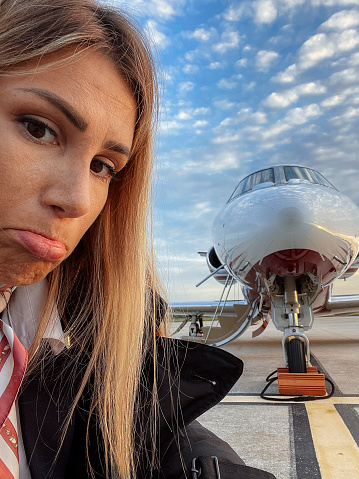 Woman disapointed that her flight is cancelled
