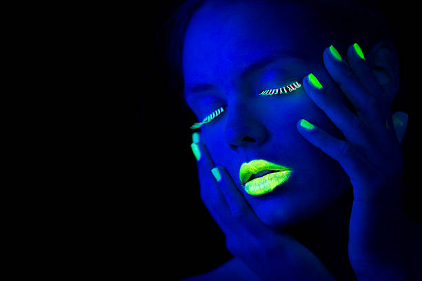 istock Women Portrait in Neon Light with Lime Green Fingernails 174768292