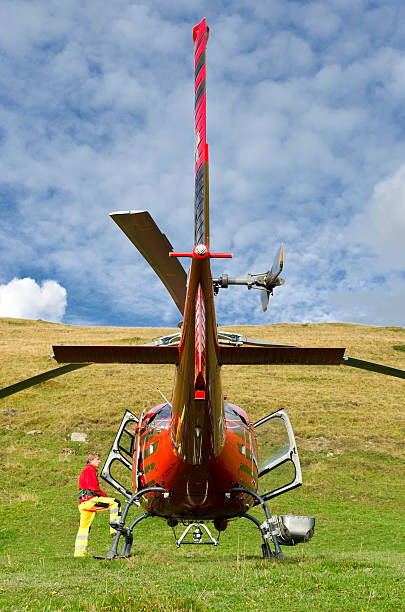 istock Rescue helicopter and pilot on the Swiss Alps 174768805
