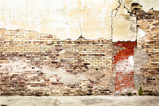 istock Grunge brick wall stucco plaster red white sidewalk 174768993