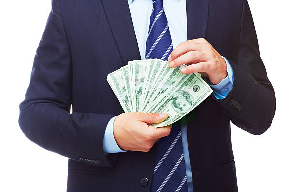 istock Money makes the business world go around 174769068