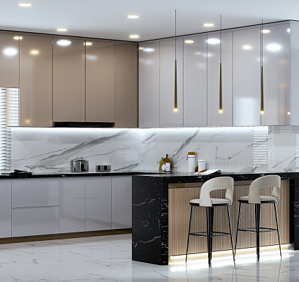 modern kitchen with hanging light stools and a counter with a black and white marble top.