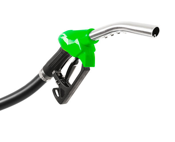 green fuel pump on white - industrislang bildbanksfoton och bilder