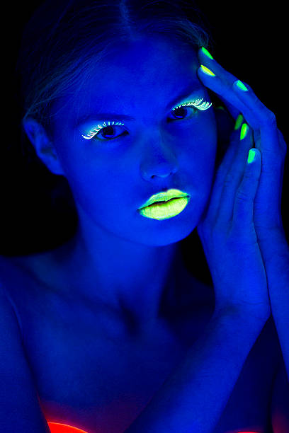 istock Women Portrait with Lime Green Fingernails in Neon Light 174769517