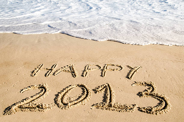 novo ano 2013 - 2013 beach sand new years day imagens e fotografias de stock