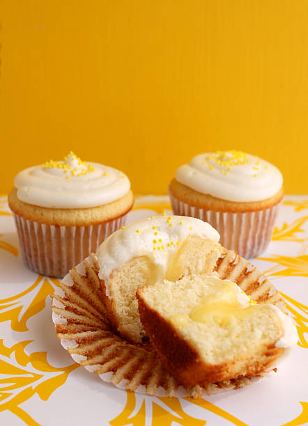 Lemon filled cupcake stock photo