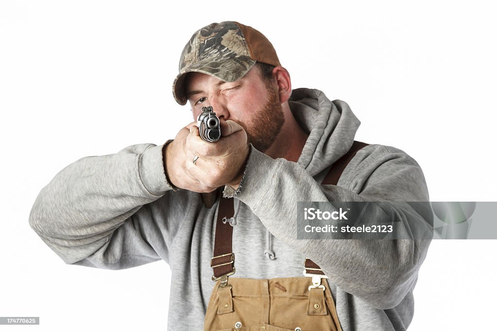 Hombre apuntando pistola - Foto de stock de Caza libre de derechos