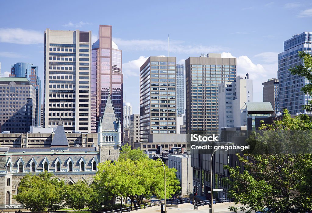 McGill University and office towers in Montreal, Quebec Educational buildings on the McGill University campus in downtown Montreal with office buildings in the distance. McGill University Stock Photo