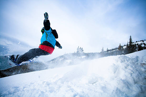 istock Boy snowboarding in the mountain 174771209