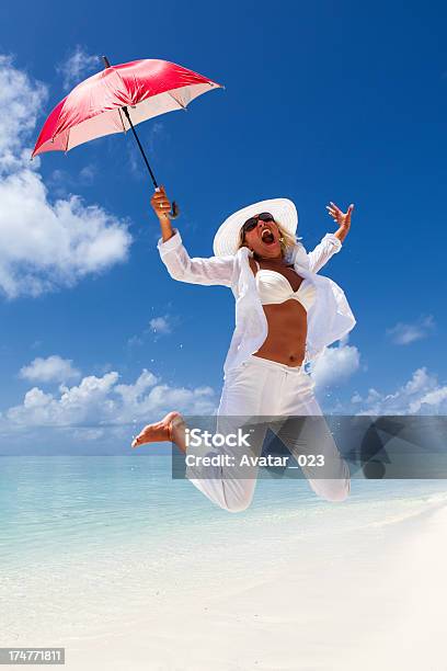 Happy Girl On The Beach Stock Photo - Download Image Now - Maldives, Women, 20-24 Years