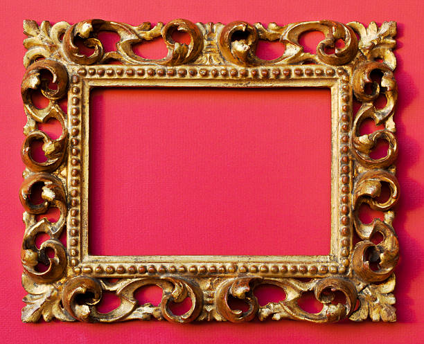 istock Ornate gilded picture frame on red background. 174772243