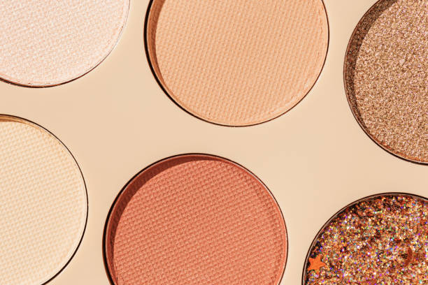 istock Top view texture pattern with different eye shadow swatches, multi colors palette in beige plastic package. Close up eyeshadows powder for makeup, cosmetics texture design, beauty background 1747722441