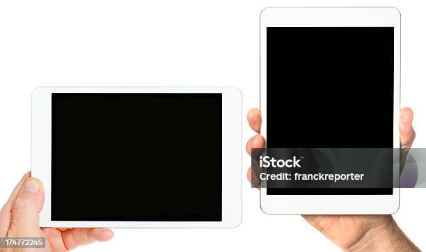 Ludzkie Ręce Trzymając Dwa Nowoczesny Tablet - zdjęcia stockowe i więcej obrazów Białe tło - Białe tło, Biały, Czytnik książek elektronicznych