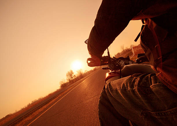 istock Riding motorcycle in the sunset 174772378
