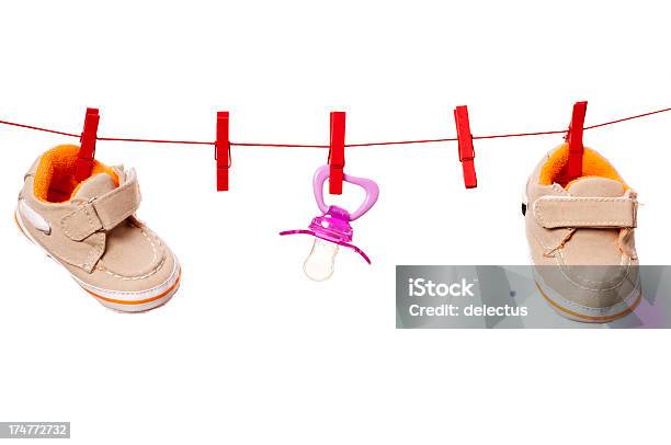 Concept Baby Pregnancy Stock Photo - Download Image Now - Baby Booties, Clothesline, Clothespin