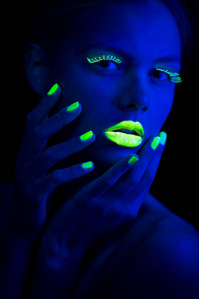 istock Women Portrait with Lime Green Fingernails in Neon Light 174773551