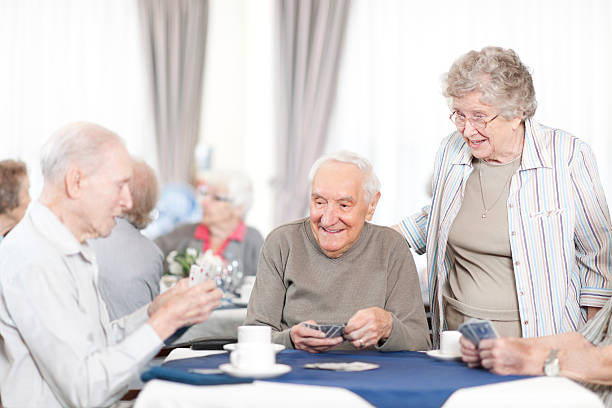 istock Senior citizens playing cards 174773594