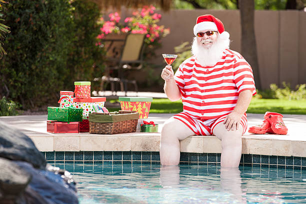 istock Real Santa Relaxing by the Pool 174773879