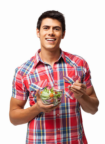 istock Man With a Bowl Of Fresh Vegetable Salad - Isolated 174773885