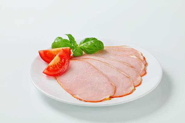 istock Slices of ham with basil and tomato 174773936