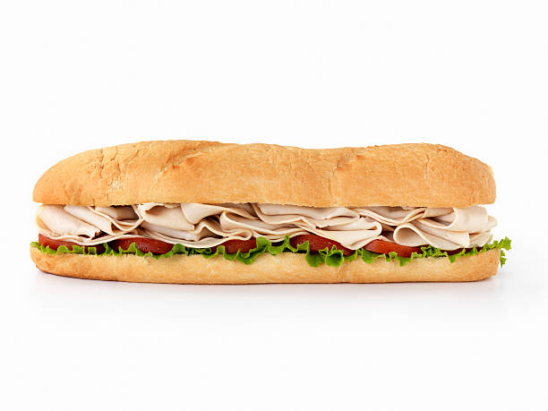 pies de largo turquía bocadillo submarino - sandwich turkey chicken submarine sandwich fotografías e imágenes de stock