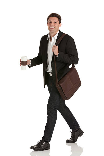 istock Businessman walking with a disposable cup 174774040