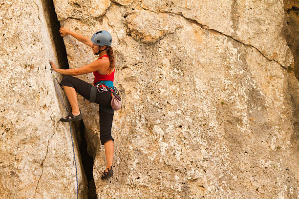 istock Woman rockclimbing 174774167