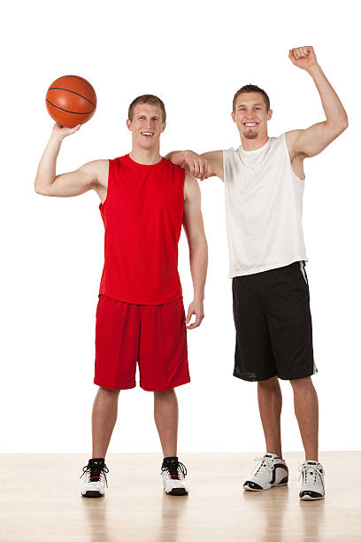 istock Two basketball players celebrating their success 174774475