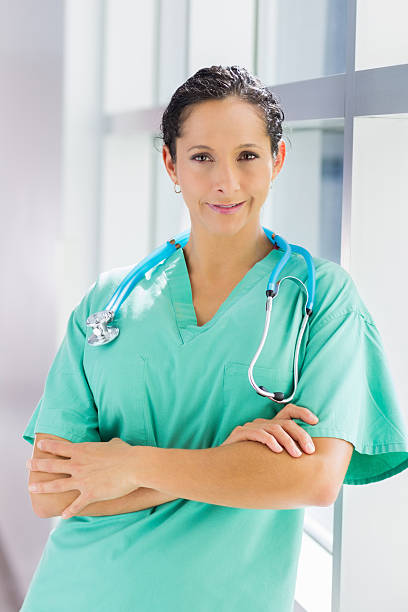 istock Nurse looking at camera with her arms crossed 174774659
