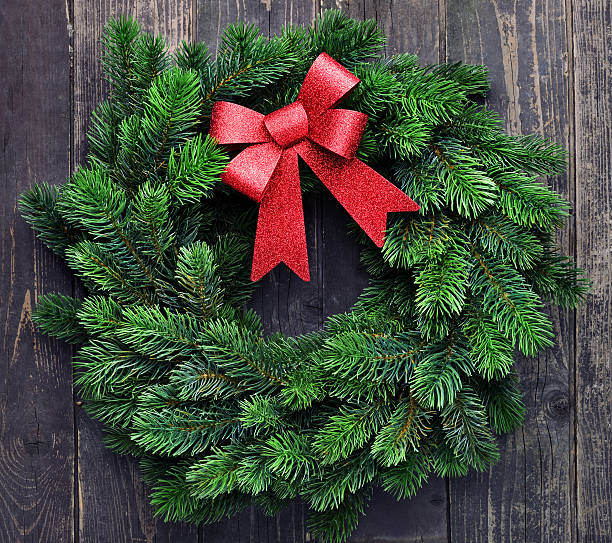 istock Wreath on old wooden background 174776263