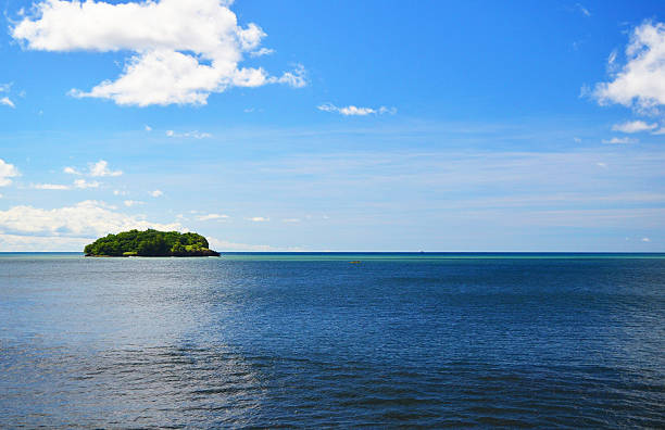 istock green island on serene blue sea 174776268
