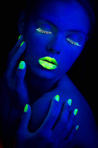 istock Women Portrait in Neon Light with Lime Green Fingernails 174776476