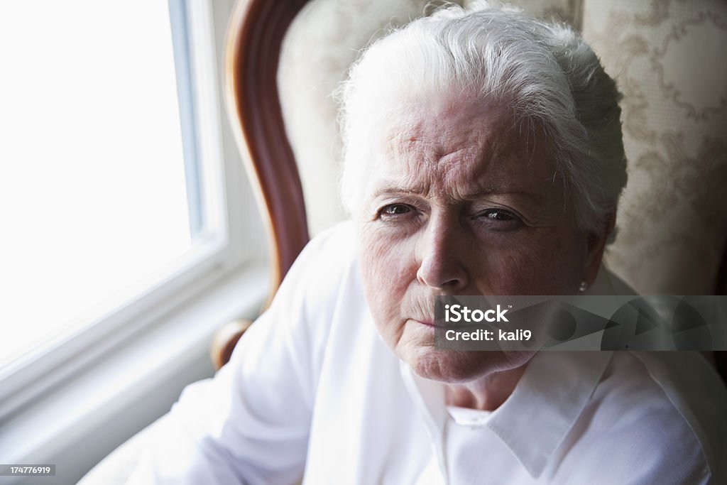 Mujer de edad avanzada - Foto de stock de Descontento libre de derechos