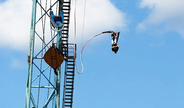 Couple bungee jumping