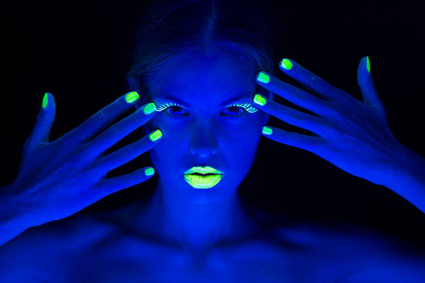 istock Women Portrait with Lime Green Fingernails in Neon Light 174777481