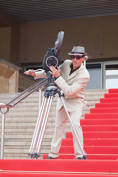 Man filming on the red carpet