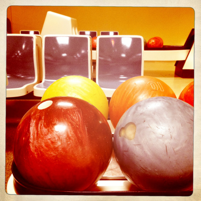 Bowling balls. Shot with iPhone 4S and Hipstamatic.