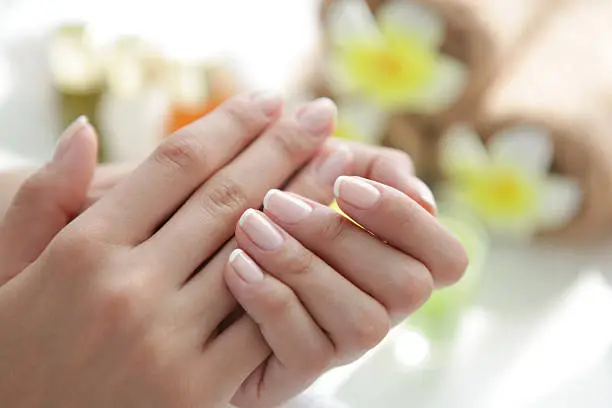 Close up of beautiful female hands having manicure treatment.See more MANICURE and SPA images. Click on image below for lightbox.