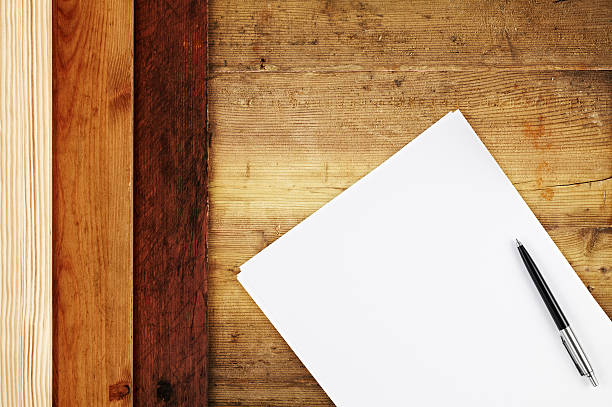 istock Above view of some woods, papers and ink pen on workbench 174777864