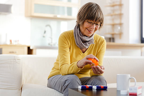 Senior Woman taking medicine