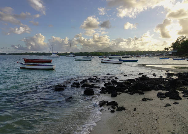 Grand Baie, Mauritius - Jan 11, 2017. Sunset on the beach in Grand Baie, Mauritius. Mauritius received the World Leading Island Destination award for the third time.