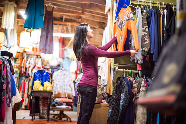 istock Thrift Store Shopping Young Woman 174778381