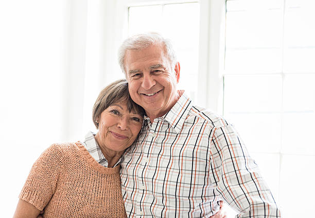 istock Seniors grandparents standing embraced on a Kitchen 174779077