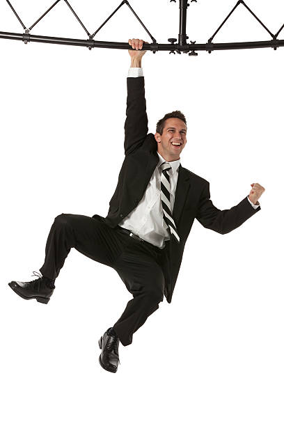 istock Businessman hanging with a metal structure 174779284
