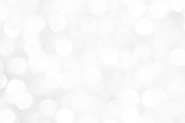 istock White and gray bokeh background.  Celebration background concept. 1747794871