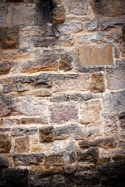 istock Old stone wall background with vignette and copy space 174779592