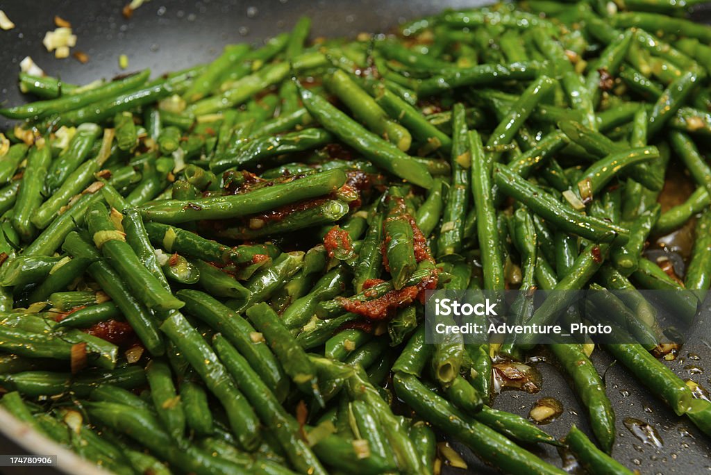 Fagiolini saltati in padella in - Foto stock royalty-free di Fagiolino