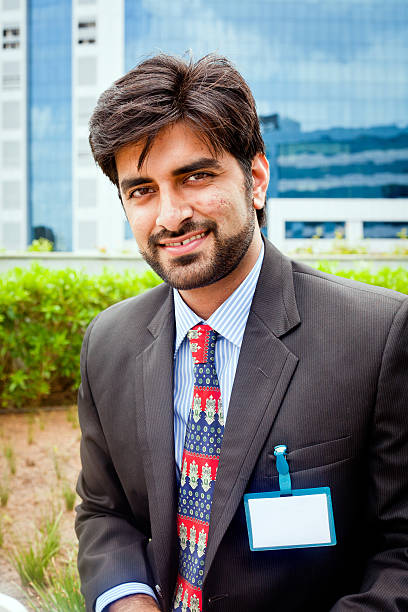 istock Cheerful friendly Confident Young Asian Indian Businessman 174781119